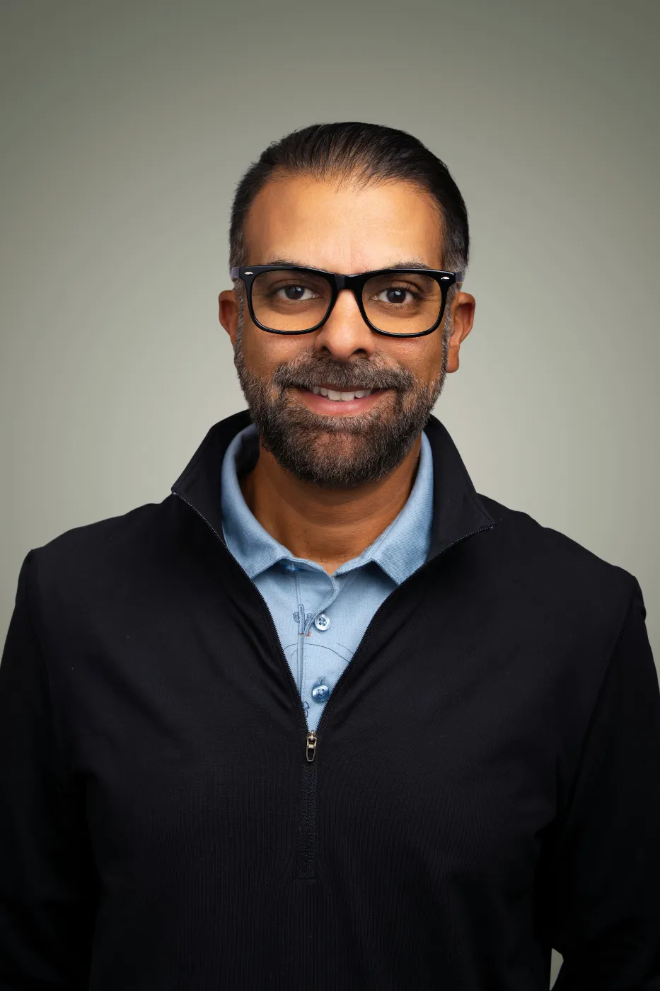 Headshot portrait of Jay Rampuria, GM