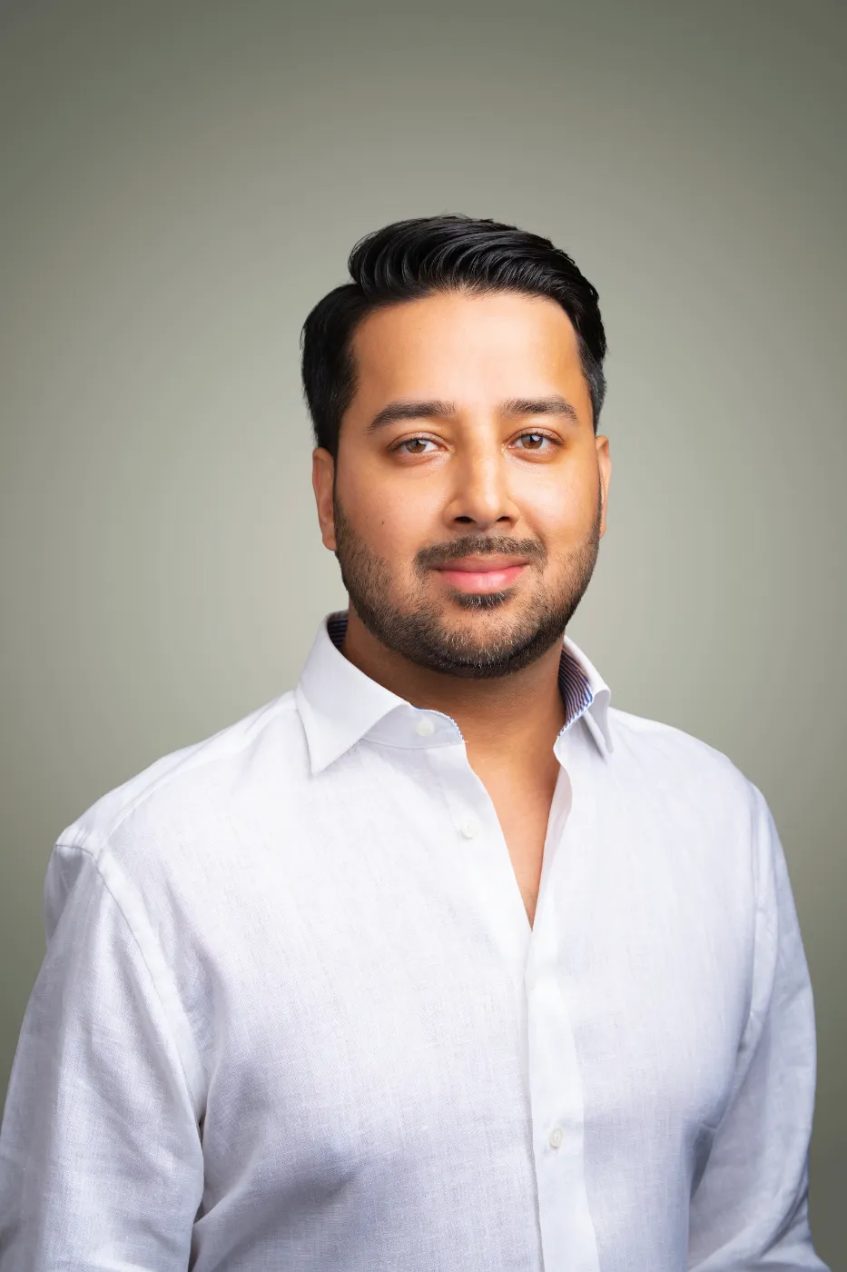 Headshot portrait of Sami Ahmed, Co-Founder of Hunt Club