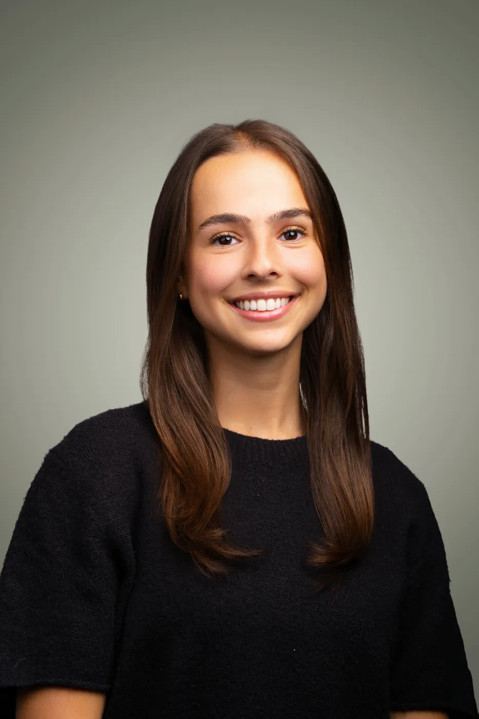 Headshot portrait of Zoey Abramson, Search Associate