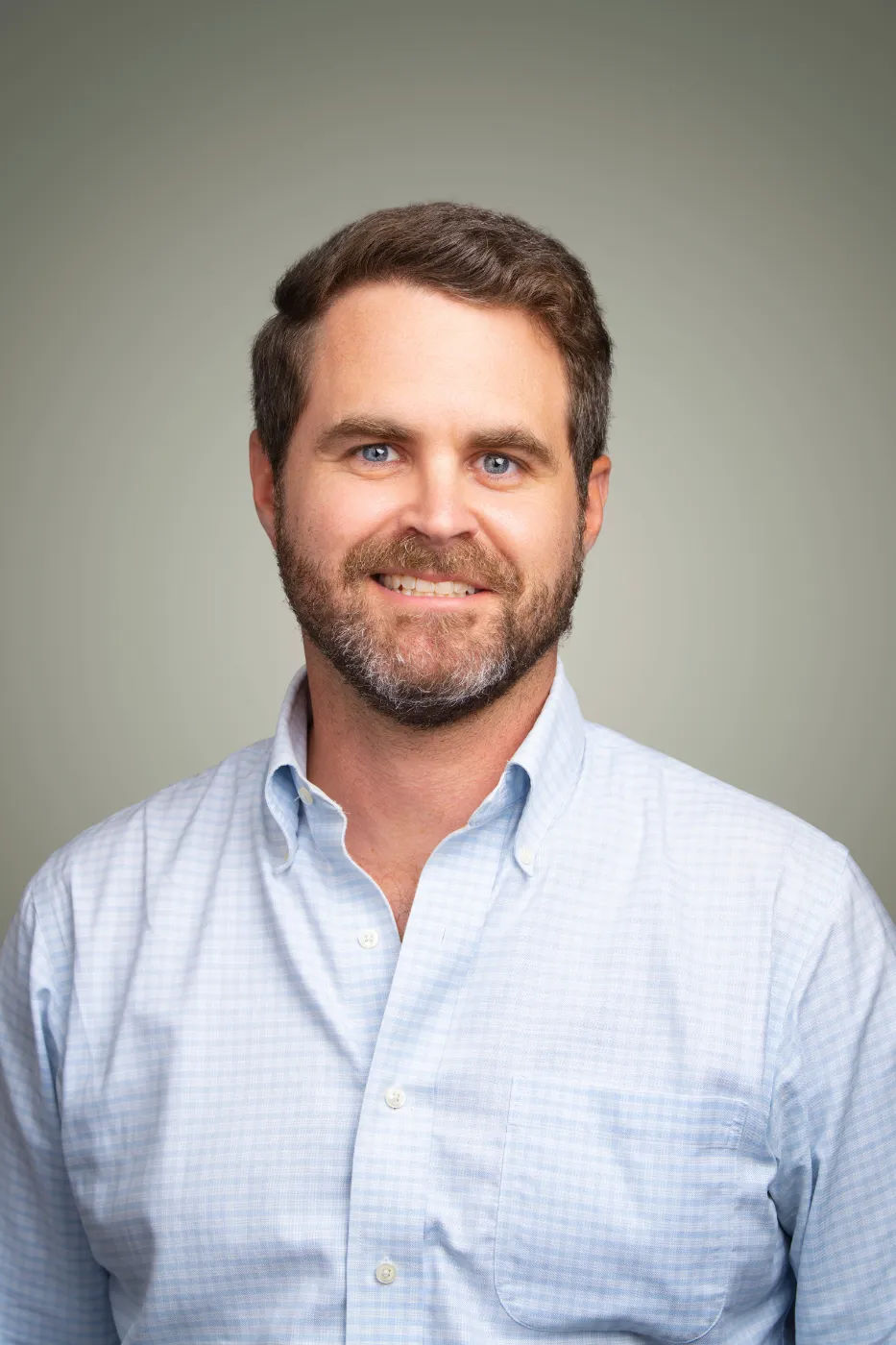 Headshot portrait of Stephen Corby, VP of Product