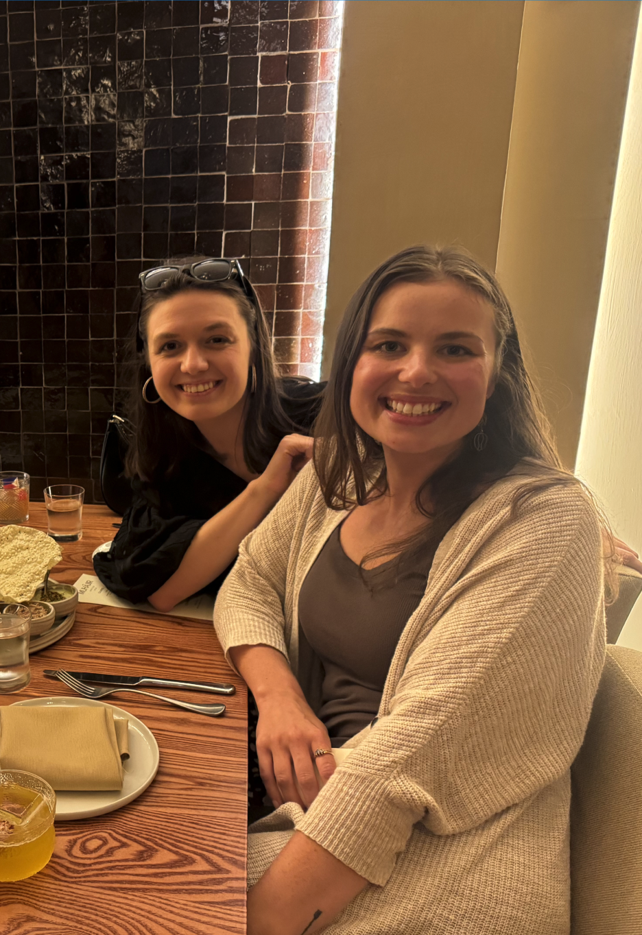Two Hunt Club teammates at dinner