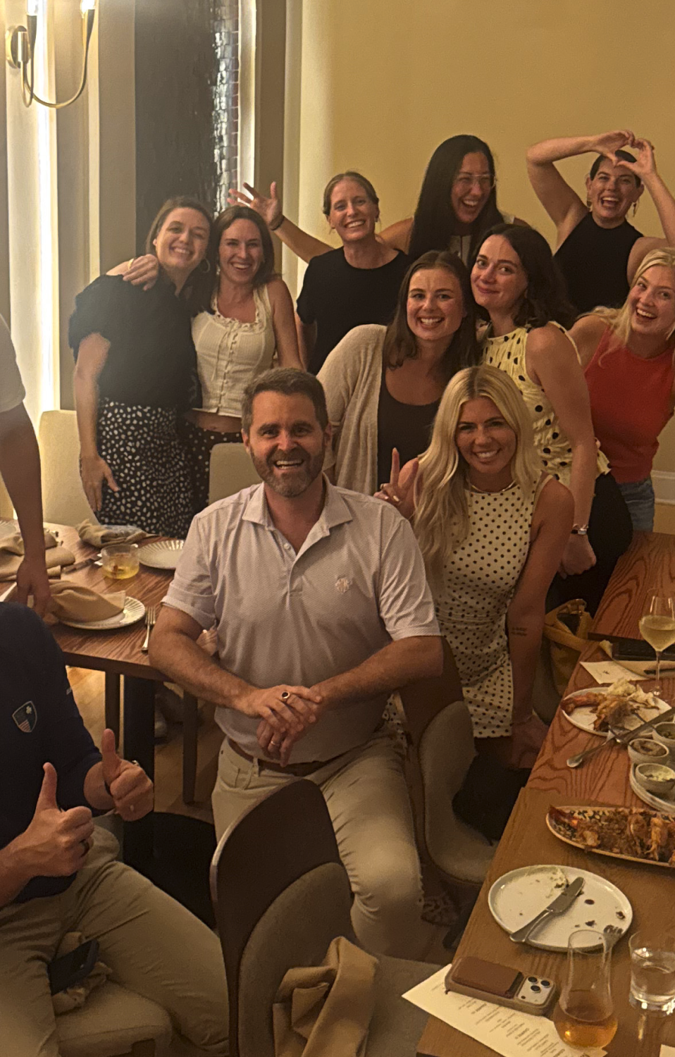 The Hunt Club team gathered around a dinner table