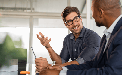 hiring manager talking to colleague 