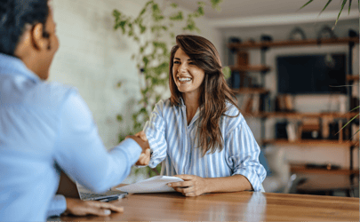 Recruiter shaking hands with candidate