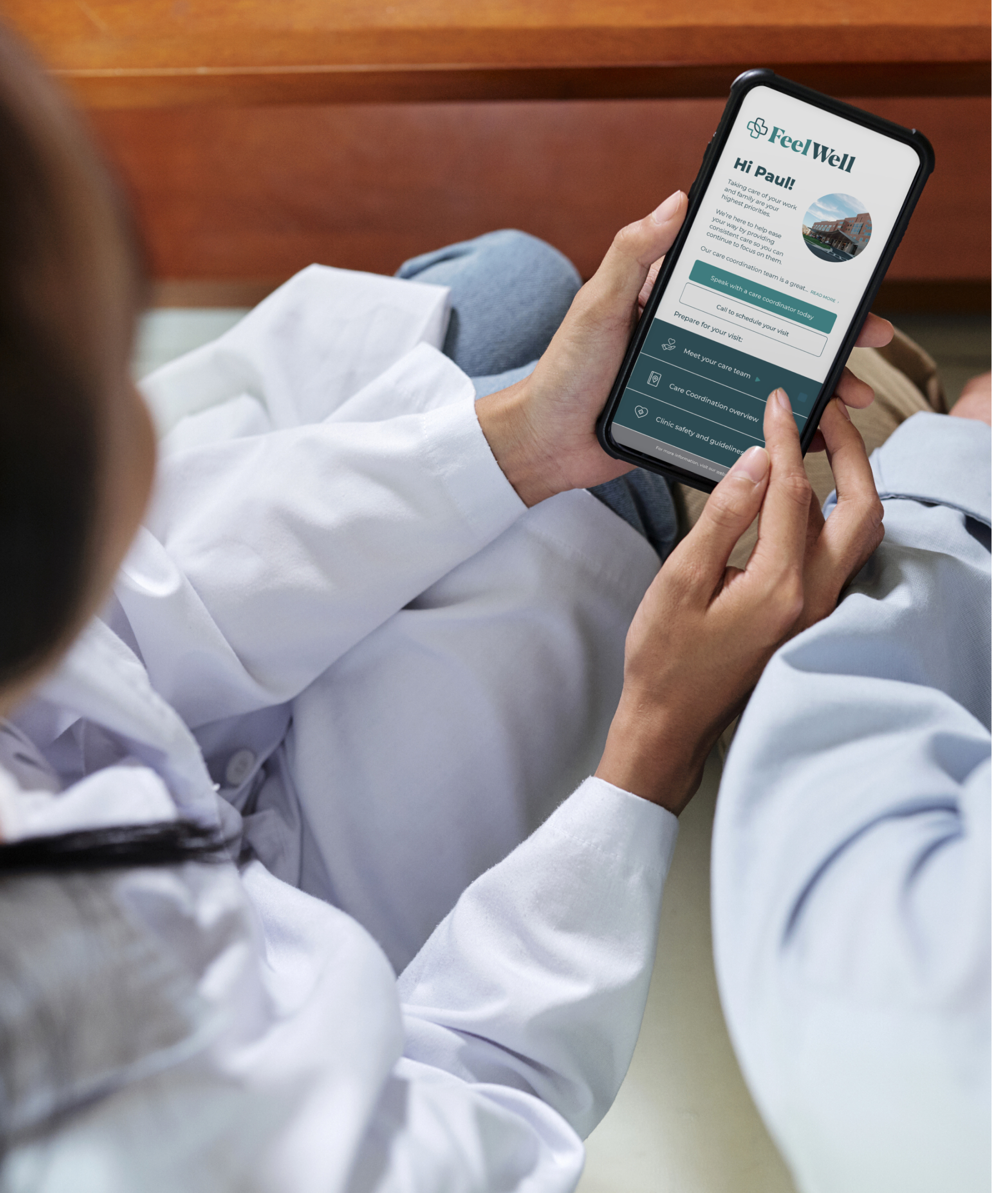 medical professional holding phone with upfront healthcare product shot on screen