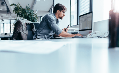 a professional working at their computer