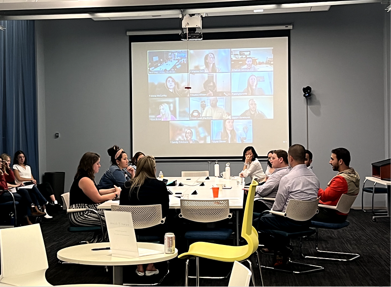 team members meeting with others on zoom