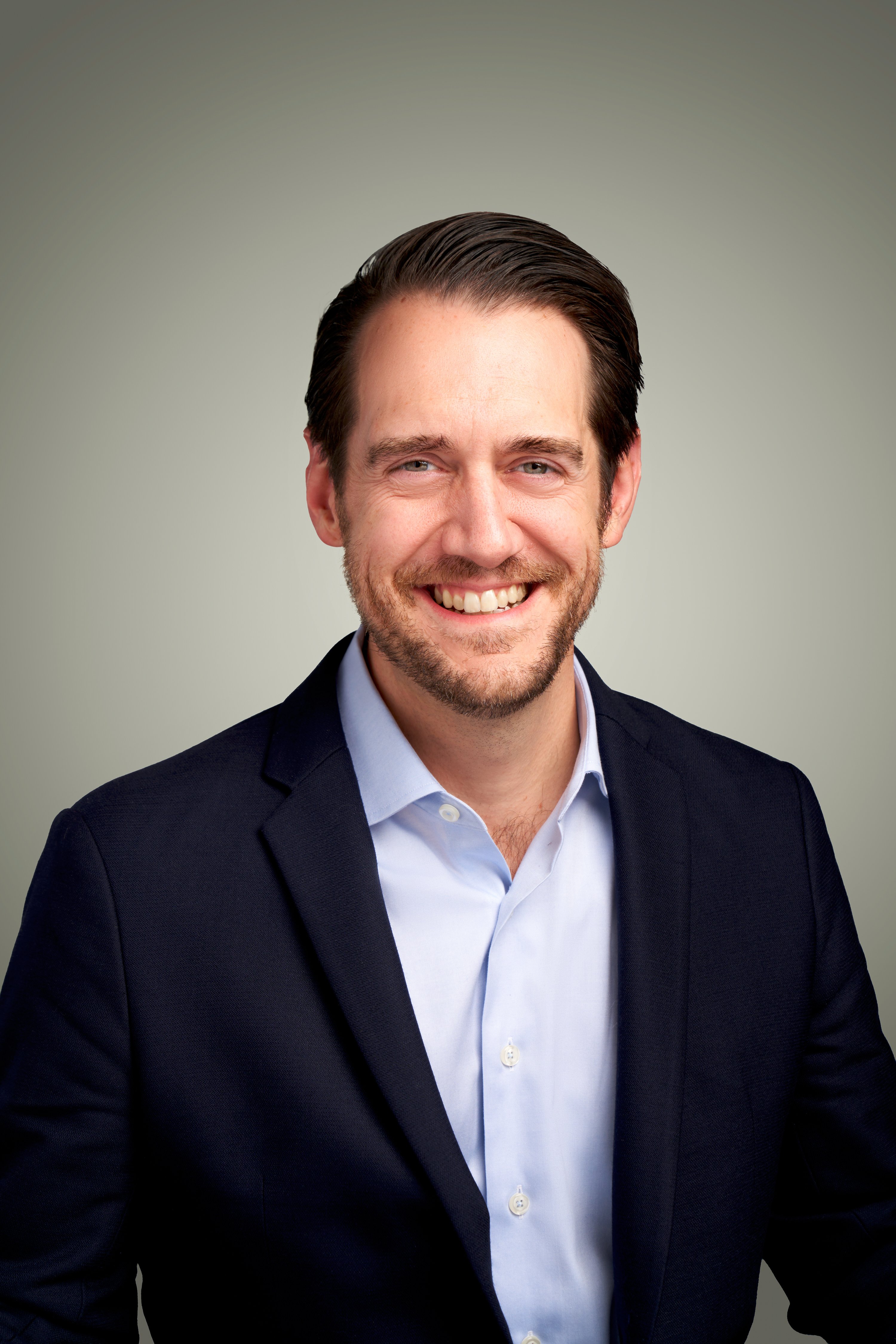 Headshot portrait of Vince Panozzo, GM