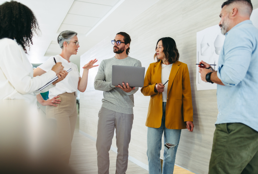 group of diverse professionals talking to each other