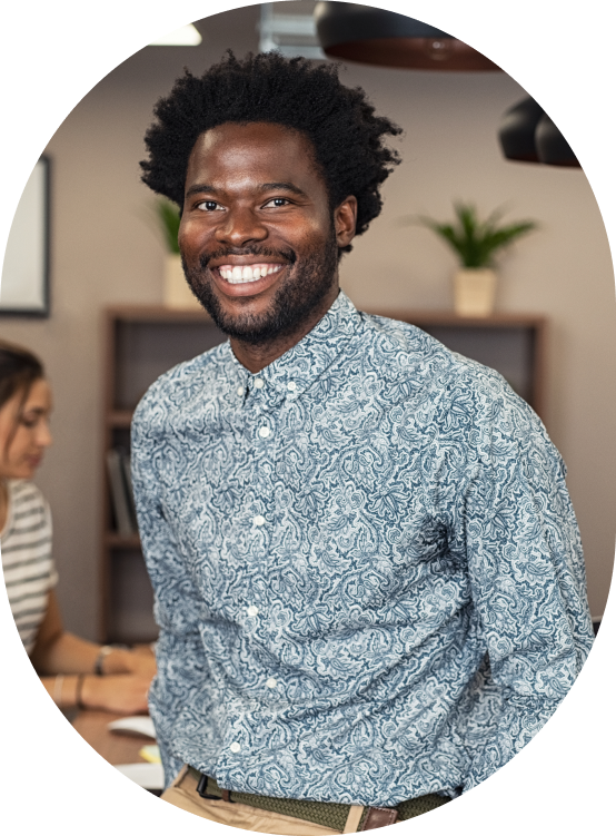 man in paisley shirt smiling