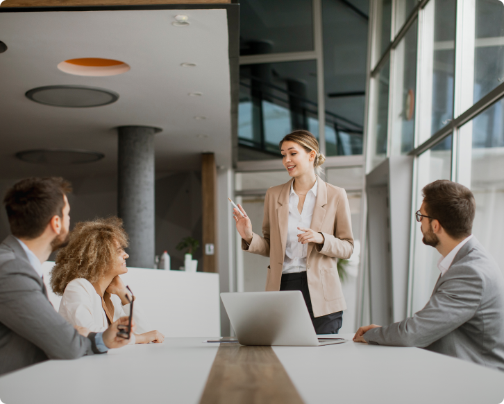 Woman standing and leading a meeting