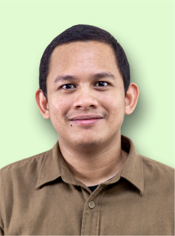 portrait of a businessman in brown shirt smiling to the camera