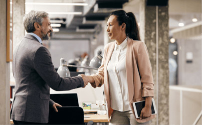 Two professionals shaking hands.