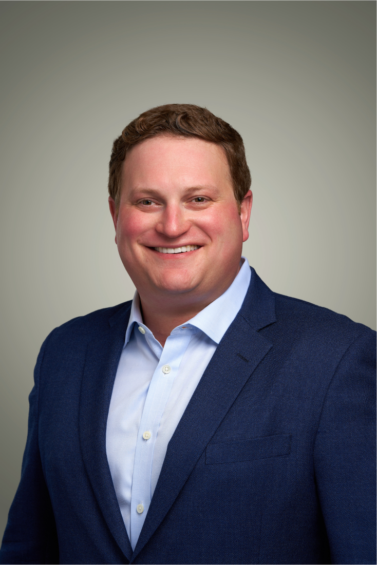 Headshot portrait of Kevin Cassman, Sr. Exec Director