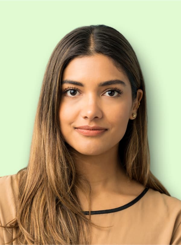 portrait of young woman with brown hair smiling